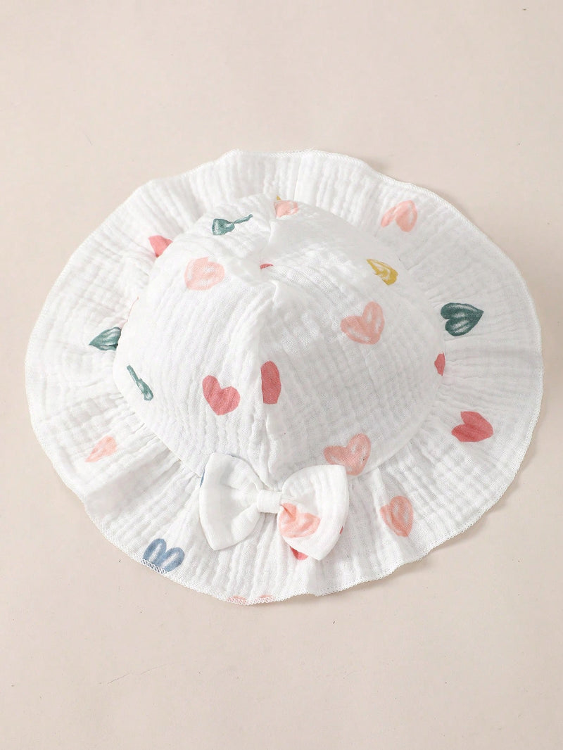 Conjunto de 2 peças para bebê menina, composto por Macaquinho Regata Reverso com Babados e Laço em Formato de Coração + Chapéu, Confortável e Versátil, Primavera/Verão